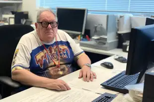 botter17_photo_of_a_fat_old_man_wearing_thick_glasses_and_a_sup_8a83ad40-36d8-41d2-991f-15cc14bcd717.png