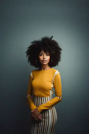 behindthecouch_an_portrait_flirty_black_woman_with_an_Afro_and__7cada7f8-e470-4843-83c8-df6274fe578a.png